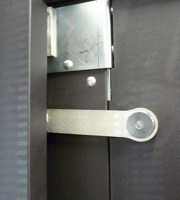 The leaf is secured with two electromechanical locks.